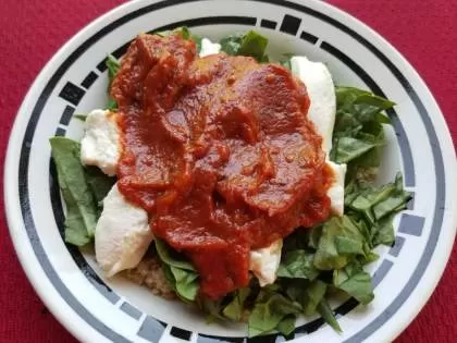 Quinoa, ricotta, chopped spinach, tender meatballs and red sauce